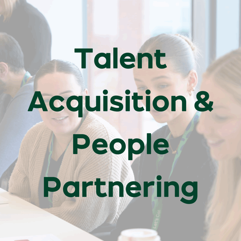"Team members engaged in discussion at a table, with the overlay text 'Talent Acquisition & People Partnering'"